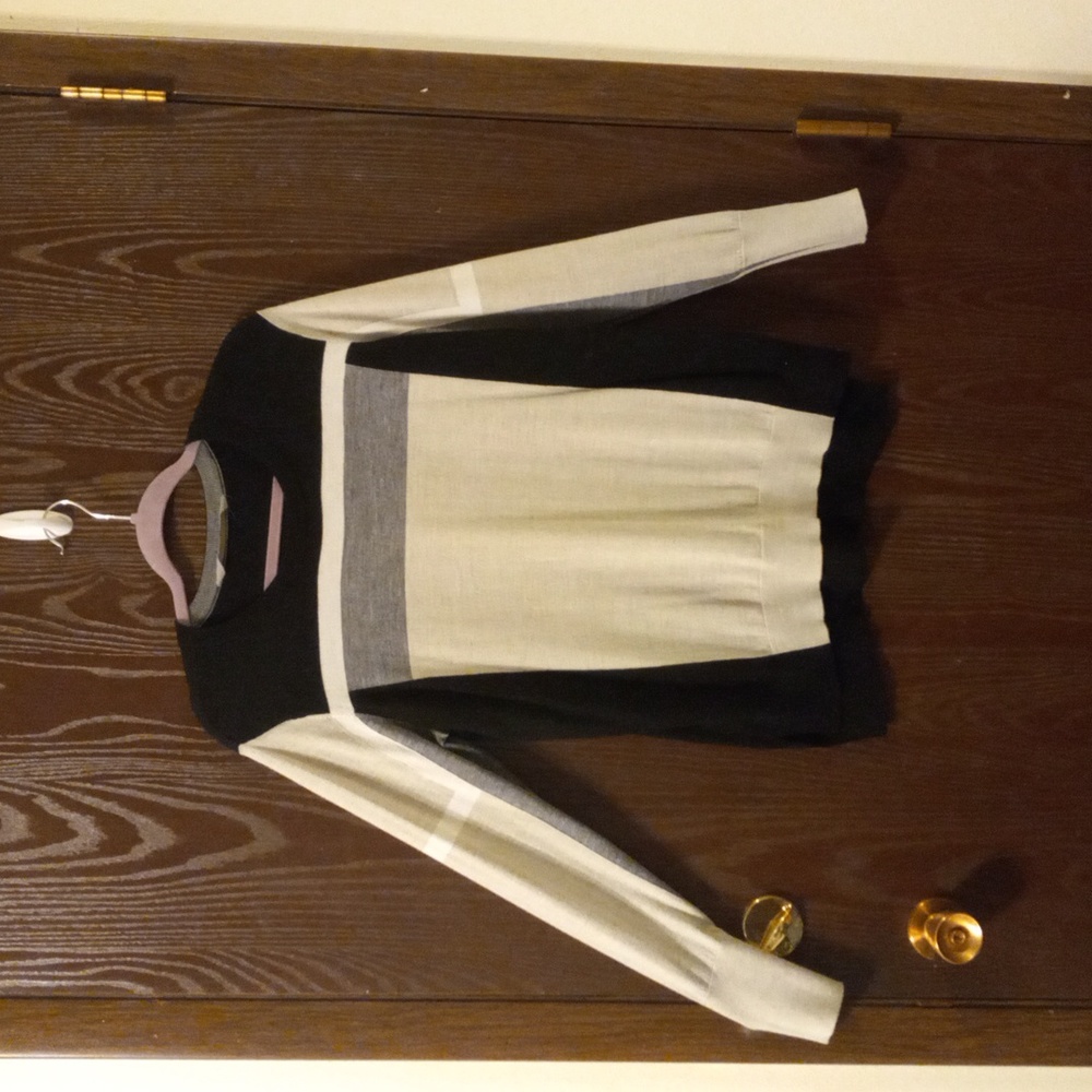 Athleta long-sleeved sweater. Black, gray and white colorblock. Large